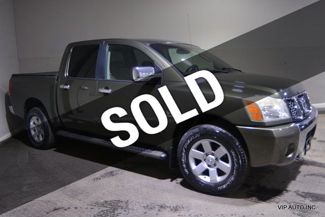 2004 Nissan Titan LE Crew Cab 4WD - 22545779 - 0