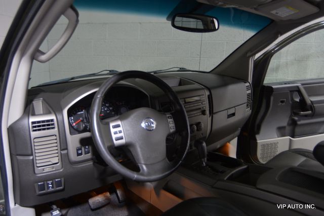 2004 Nissan Titan LE Crew Cab 4WD - 22545779 - 10