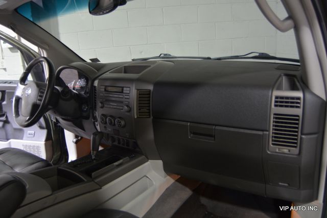 2004 Nissan Titan LE Crew Cab 4WD - 22545779 - 11