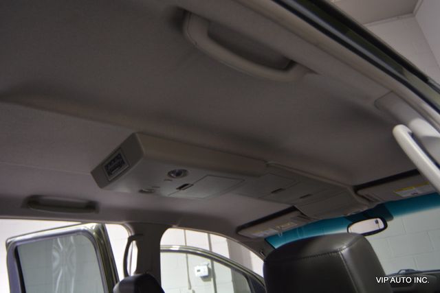 2004 Nissan Titan LE Crew Cab 4WD - 22545779 - 18