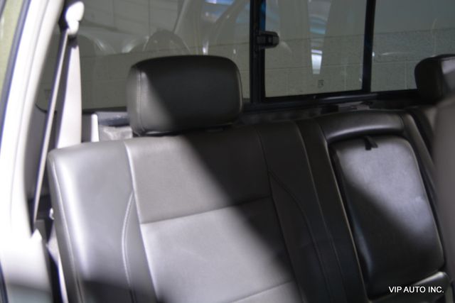 2004 Nissan Titan LE Crew Cab 4WD - 22545779 - 23