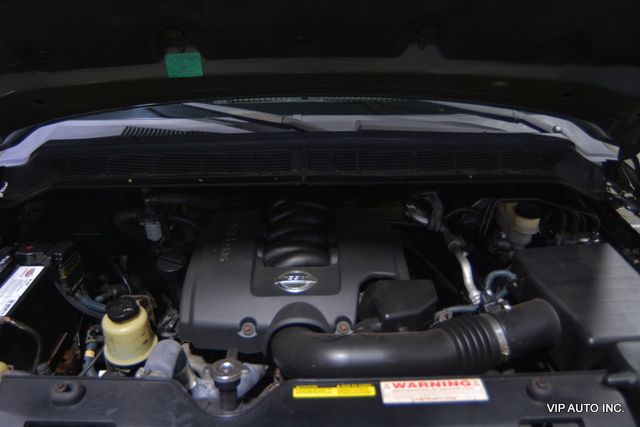 2004 Nissan Titan LE Crew Cab 4WD - 22545779 - 28