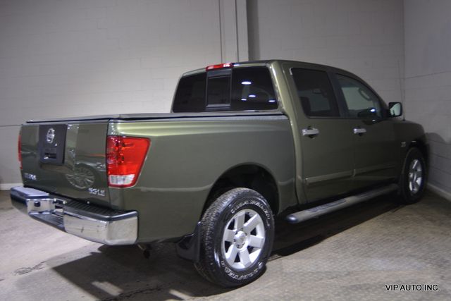 2004 Nissan Titan LE Crew Cab 4WD - 22545779 - 32