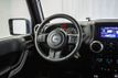2014 Jeep Wrangler Unlimited 4WD 4dr Sahara - 22408674 - 3