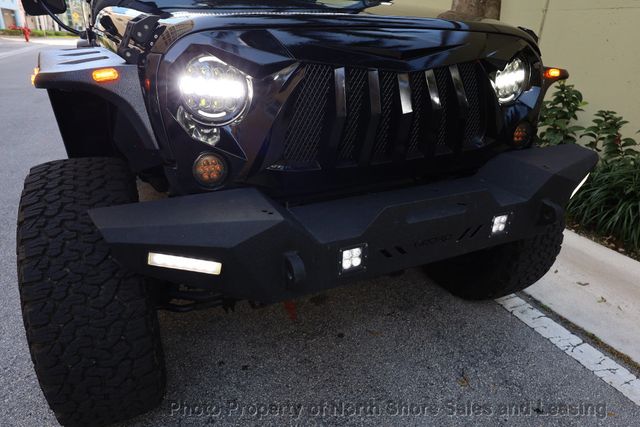 2015 Jeep Wrangler Unlimited 4WD 4dr Sport - 22383261 - 24