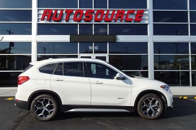 2016 BMW X1 - WBXHT3C35GP882434