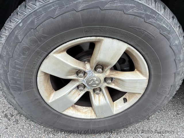 2016 Ram 1500 4WD Quad Cab 140.5" Tradesman - 22936210 - 16