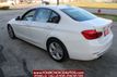 2017 BMW 3 Series 330i xDrive - 22223753 - 4