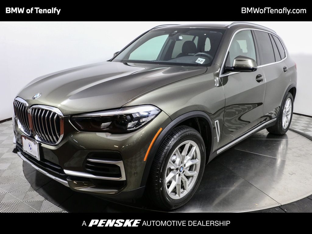 cdn.ebizautos.media/used-2023-bmw-x5-xdrive40ispor...