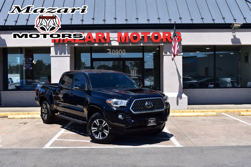 Black 2018 Toyota Tacoma Pickup Truck Four-Wheel Drive 6-Speed Automatic