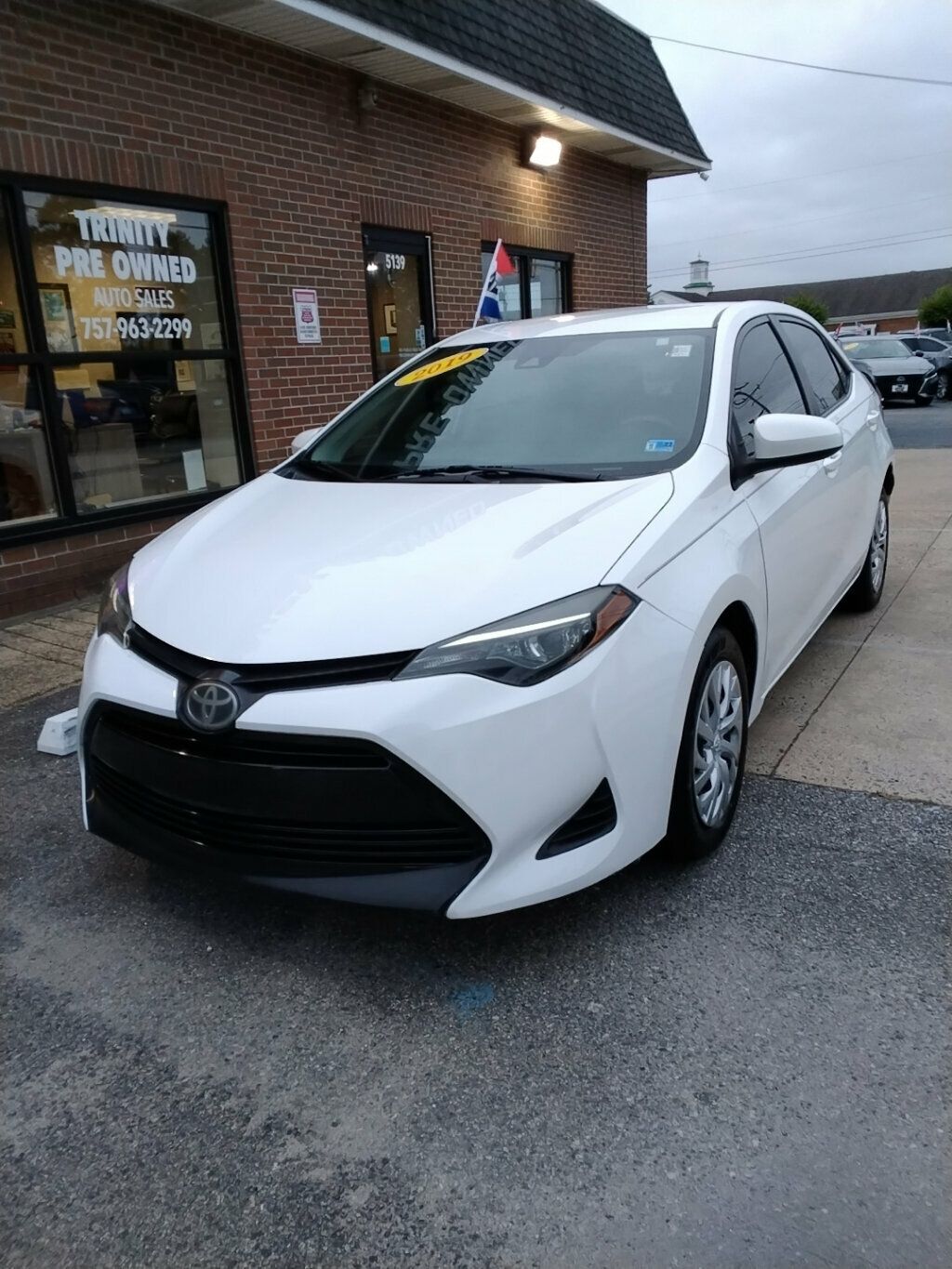Super White 2019 Toyota Corolla Sedan Front-Wheel Drive Automatic
