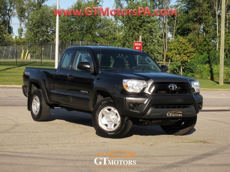 Black 2013 Toyota Tacoma Pickup Truck Four-Wheel Drive Manual