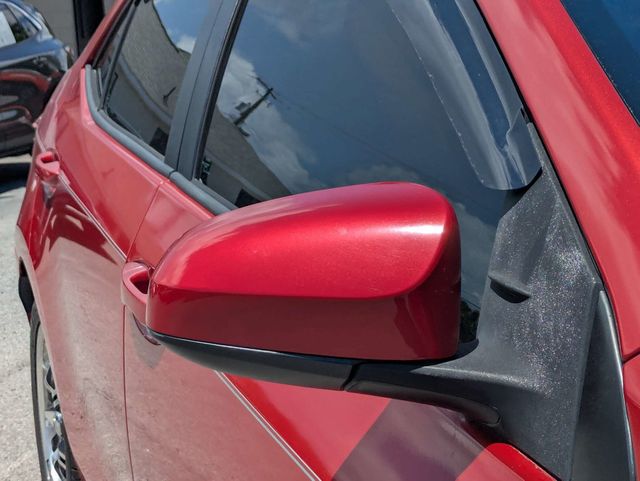 2019 Toyota Corolla  Barcelona Red Metallic at Burns Kia