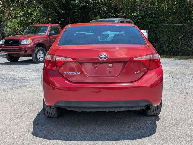 2019 Toyota Corolla  Barcelona Red Metallic at Burns Kia