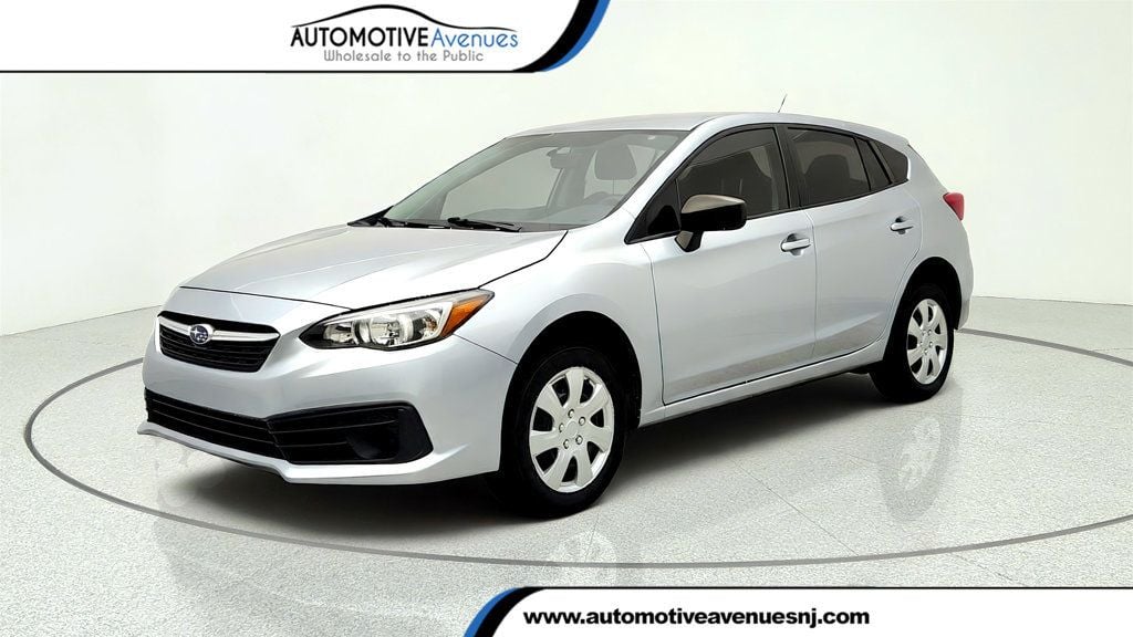 Ice Silver Metallic 2023 Subaru Impreza Sedan  5-Speed Manual