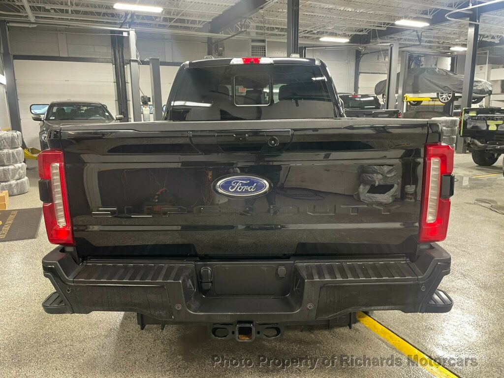 2023 Ford Super Duty F-250 SRW LARIAT 4WD Crew Cab 6.75' Box - Agate Black Metallic exterior view 6