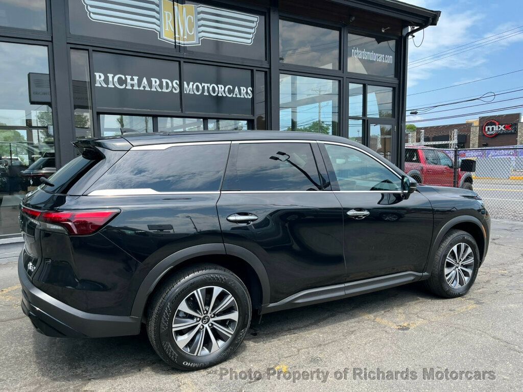 2023 INFINITI QX60 PURE AWD - Mineral Black exterior view 3
