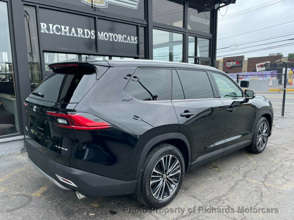 2024 Toyota Grand Highlander Platinum AWD - Midnight Black Metallic exterior view 3