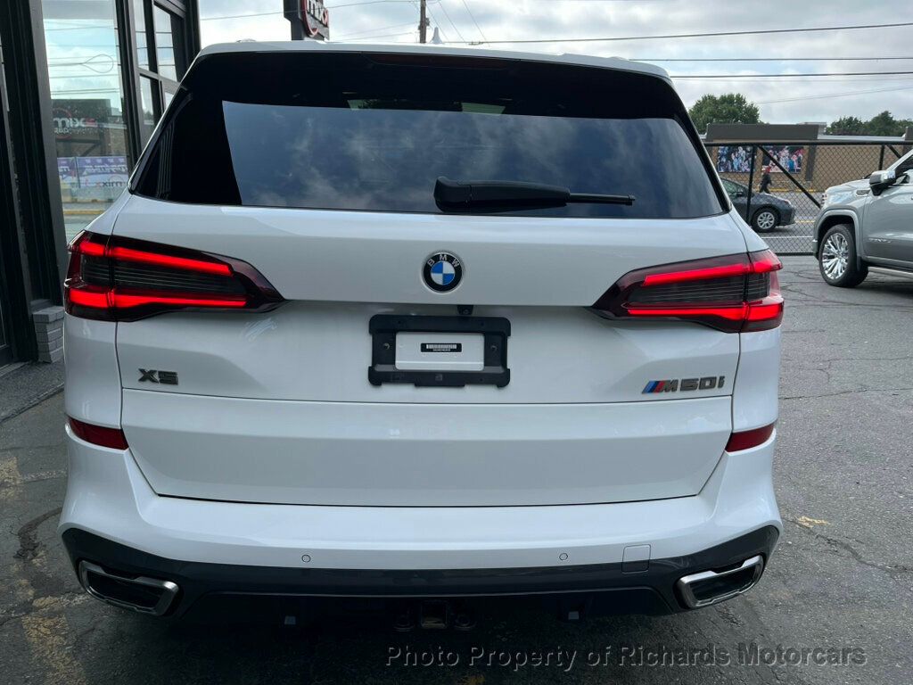 2022 BMW X5 M50i Sports Activity Vehicle - Alpine White exterior view 5