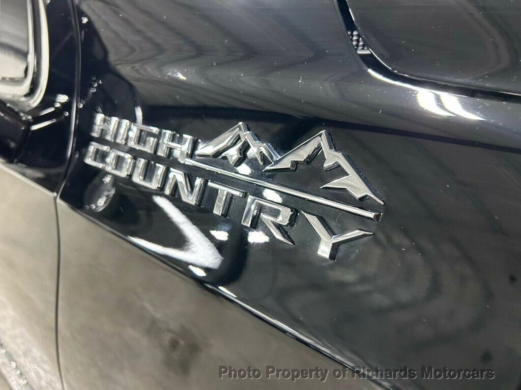 2025 Chevrolet Suburban 4WD 4dr High Country - Black exterior view 10