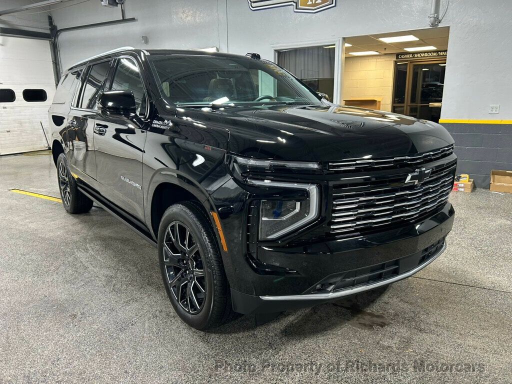 2025 Chevrolet Suburban 4WD 4dr High Country - Black exterior view 9