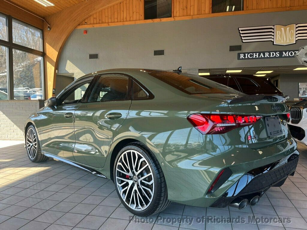 2025 Audi S3 Prestige 2.0 TFSI quattro - District Green Metallic exterior view 2