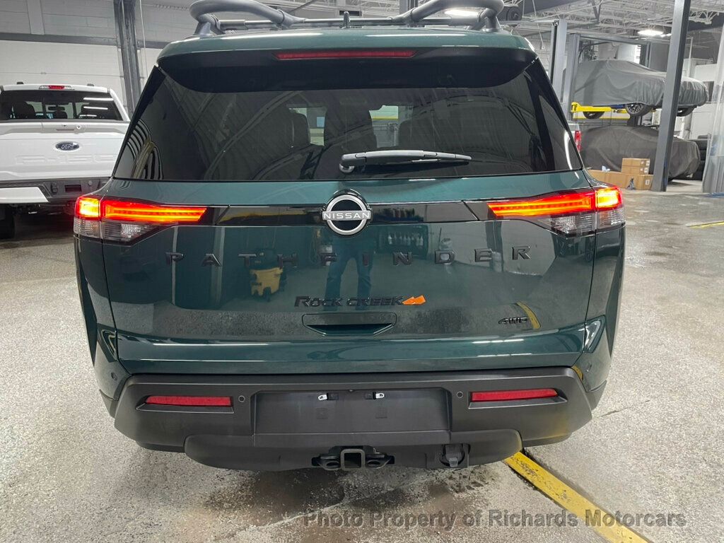 2024 Nissan Pathfinder Rock Creek 4WD - Obsidian Green Pearl exterior view 4