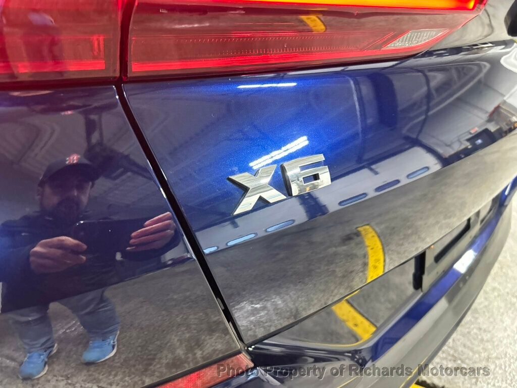 2026 BMW X6 M60i Sports Activity - Tanzanite Blue II Metallic exterior view 12