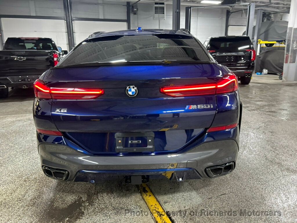 2026 BMW X6 M60i Sports Activity - Tanzanite Blue II Metallic exterior view 4