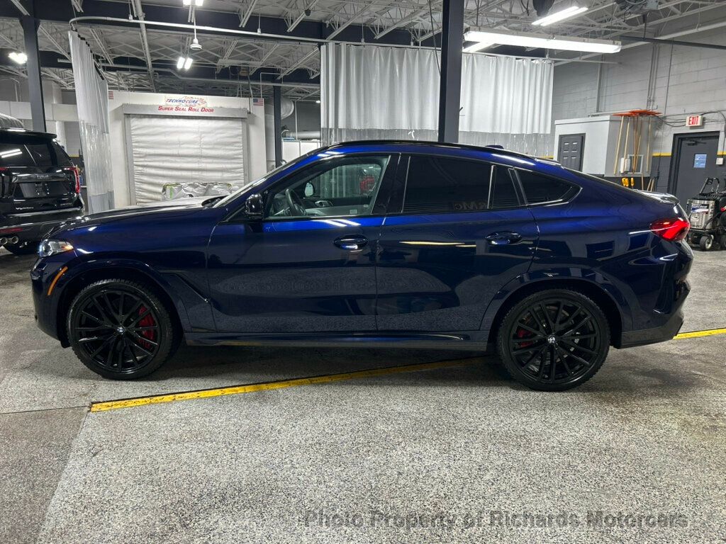 2026 BMW X6 M60i Sports Activity - Tanzanite Blue II Metallic exterior view 6