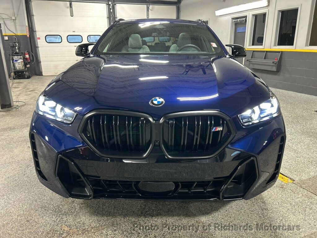 2026 BMW X6 M60i Sports Activity - Tanzanite Blue II Metallic exterior view 8