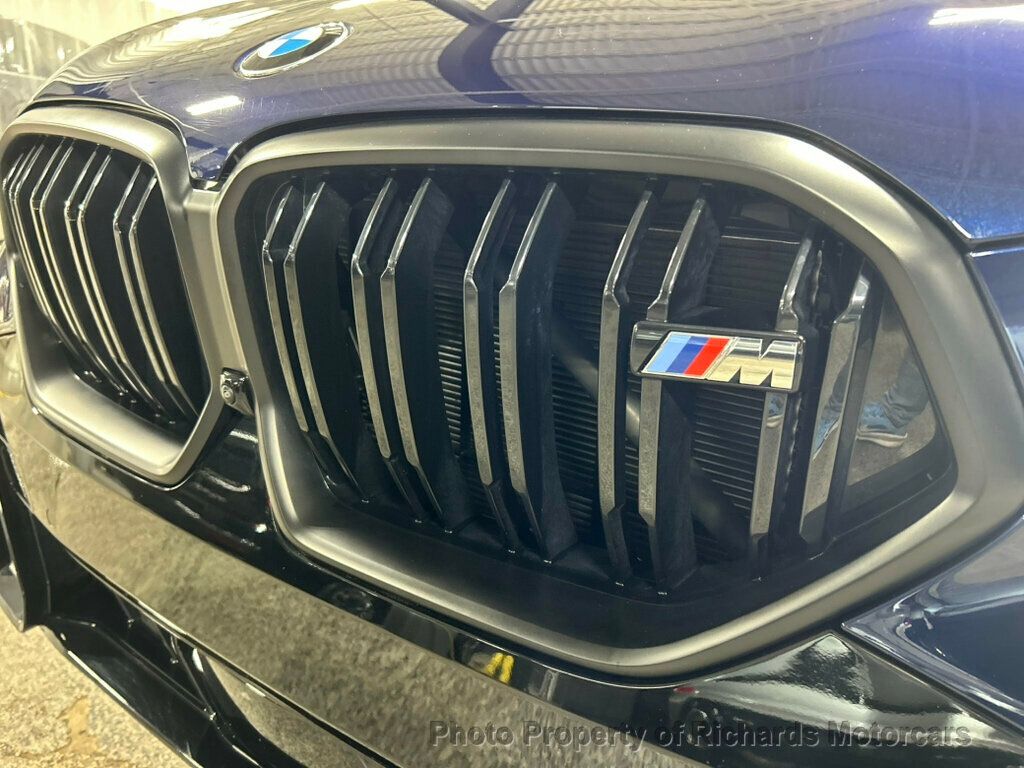 2026 BMW X6 M60i Sports Activity - Tanzanite Blue II Metallic exterior view 9