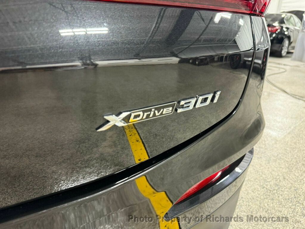 2020 BMW X4 xDrive30i Sports Activity - Black Sapphire Metallic exterior view 11