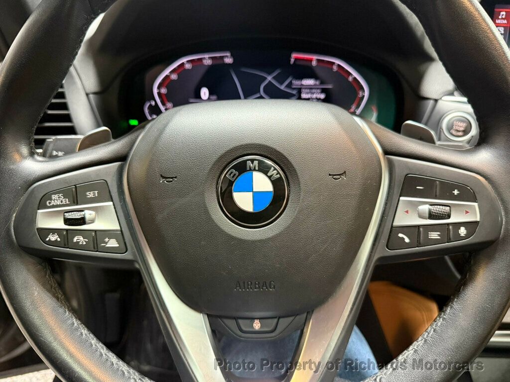 2020 BMW X4 xDrive30i Sports Activity - Black Sapphire Metallic exterior view 14