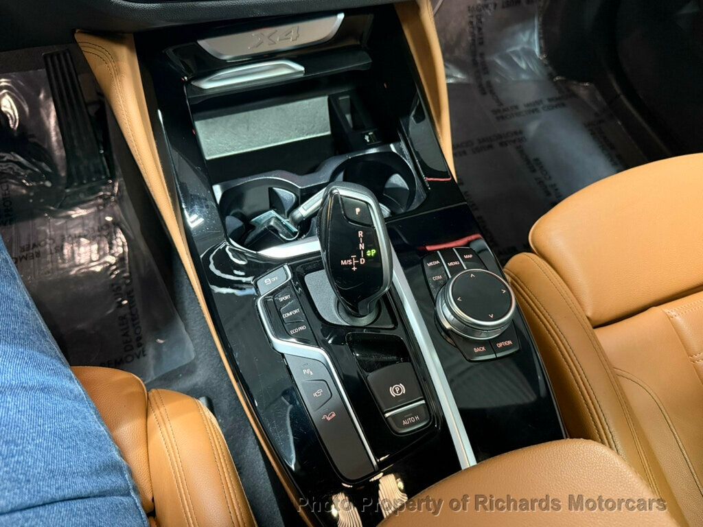 2020 BMW X4 xDrive30i Sports Activity - Black Sapphire Metallic exterior view 16