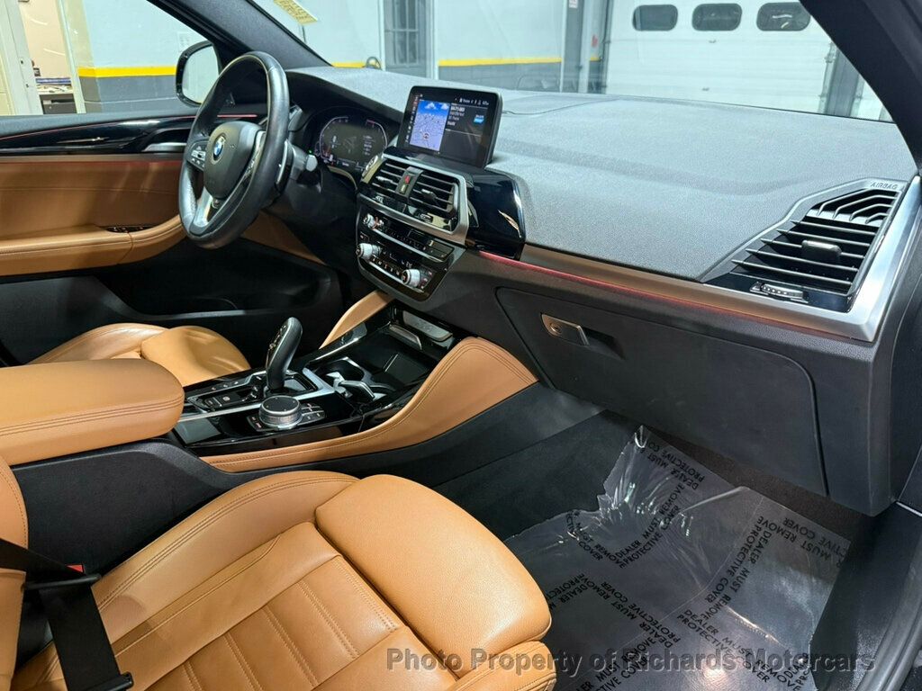 2020 BMW X4 xDrive30i Sports Activity - Black Sapphire Metallic exterior view 19