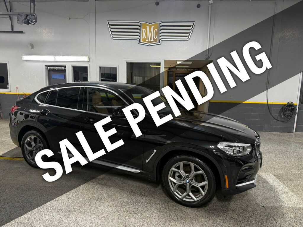 2020 BMW X4 xDrive30i Sports Activity - Black Sapphire Metallic exterior view 1