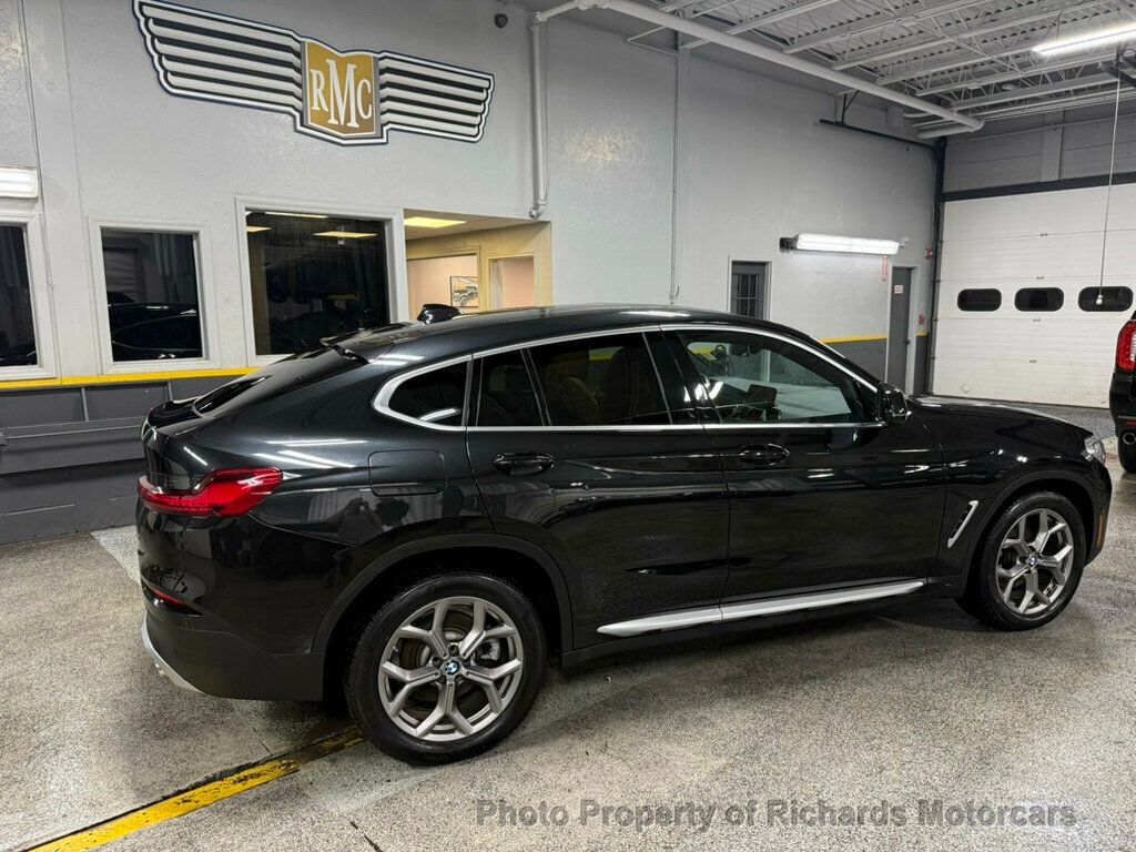 2020 BMW X4 xDrive30i Sports Activity - Black Sapphire Metallic exterior view 2