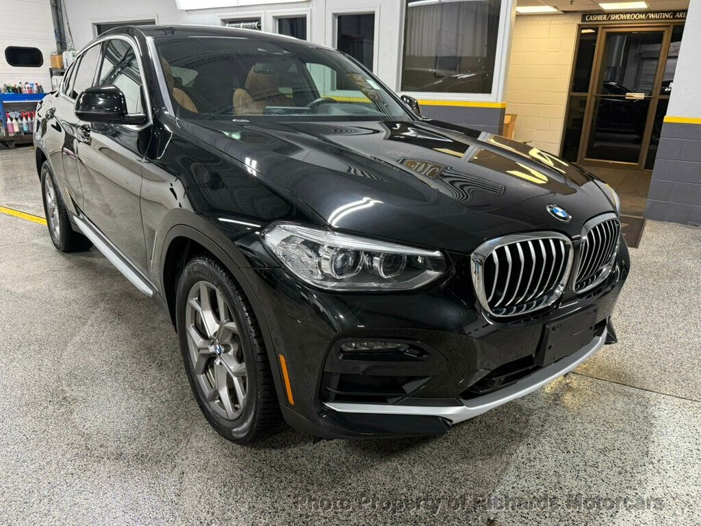 2020 BMW X4 xDrive30i Sports Activity - Black Sapphire Metallic exterior view 9