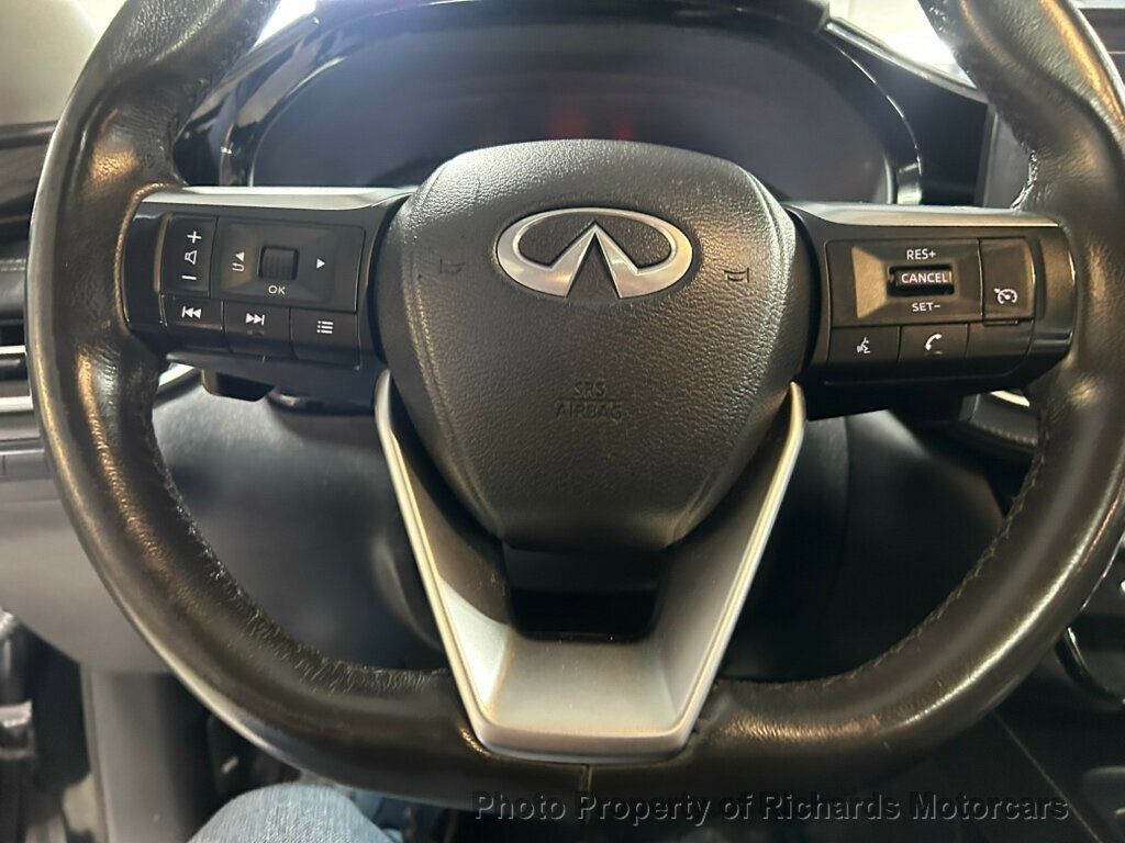 2023 INFINITI QX60 PURE AWD - Mineral Black exterior view 18
