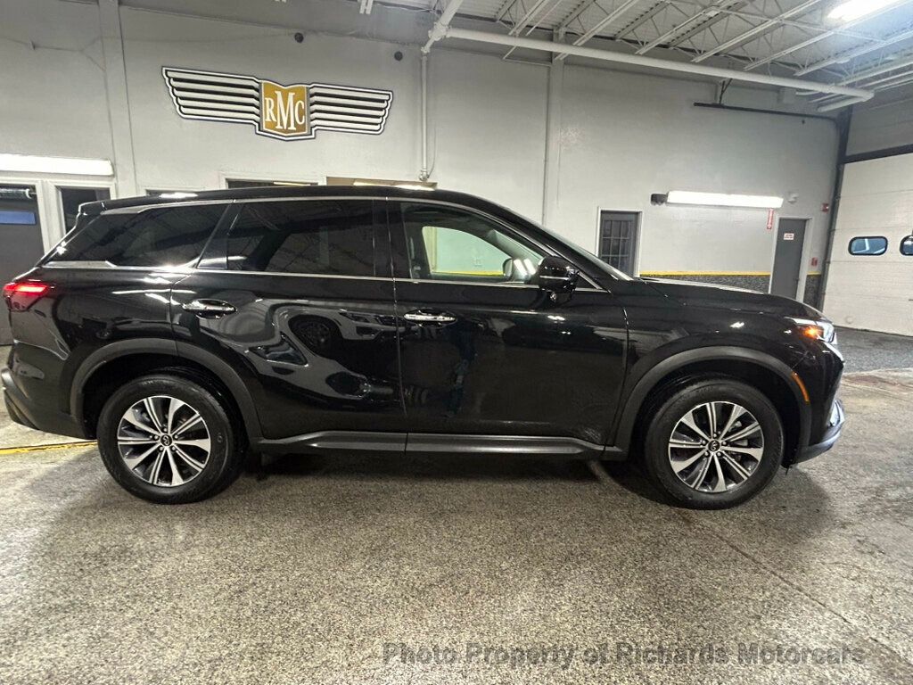 2023 INFINITI QX60 PURE AWD - Mineral Black exterior view 2