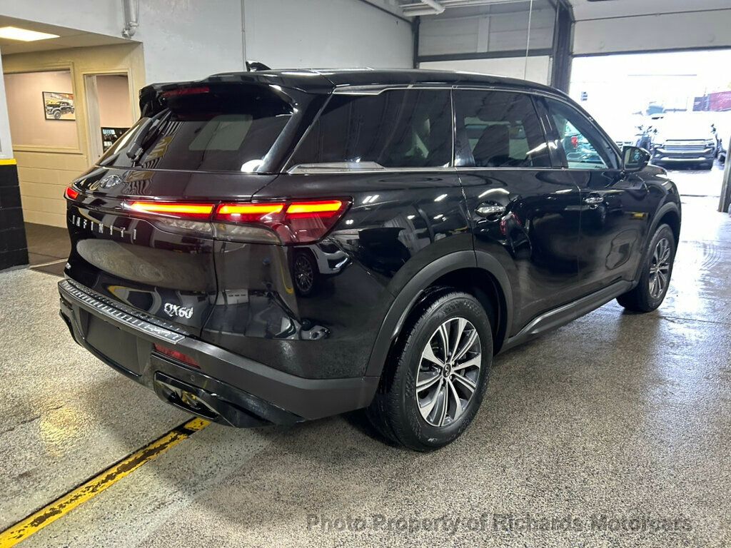 2023 INFINITI QX60 PURE AWD - Mineral Black exterior view 3