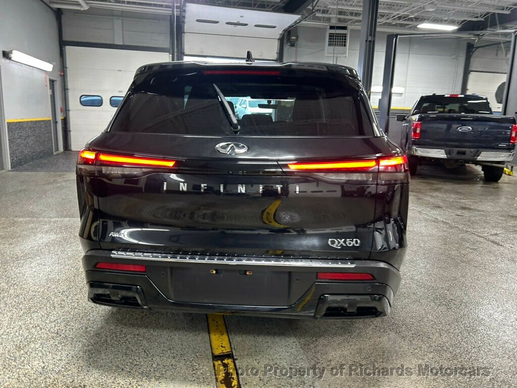 2023 INFINITI QX60 PURE AWD - Mineral Black exterior view 4
