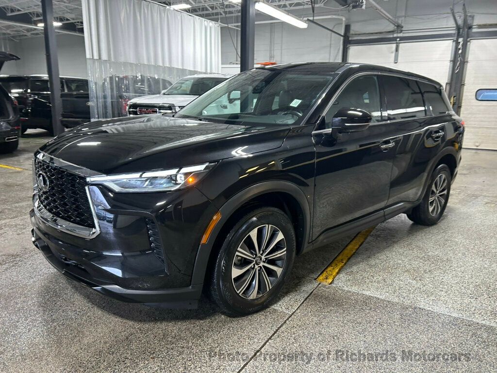 2023 INFINITI QX60 PURE AWD - Mineral Black exterior view 7