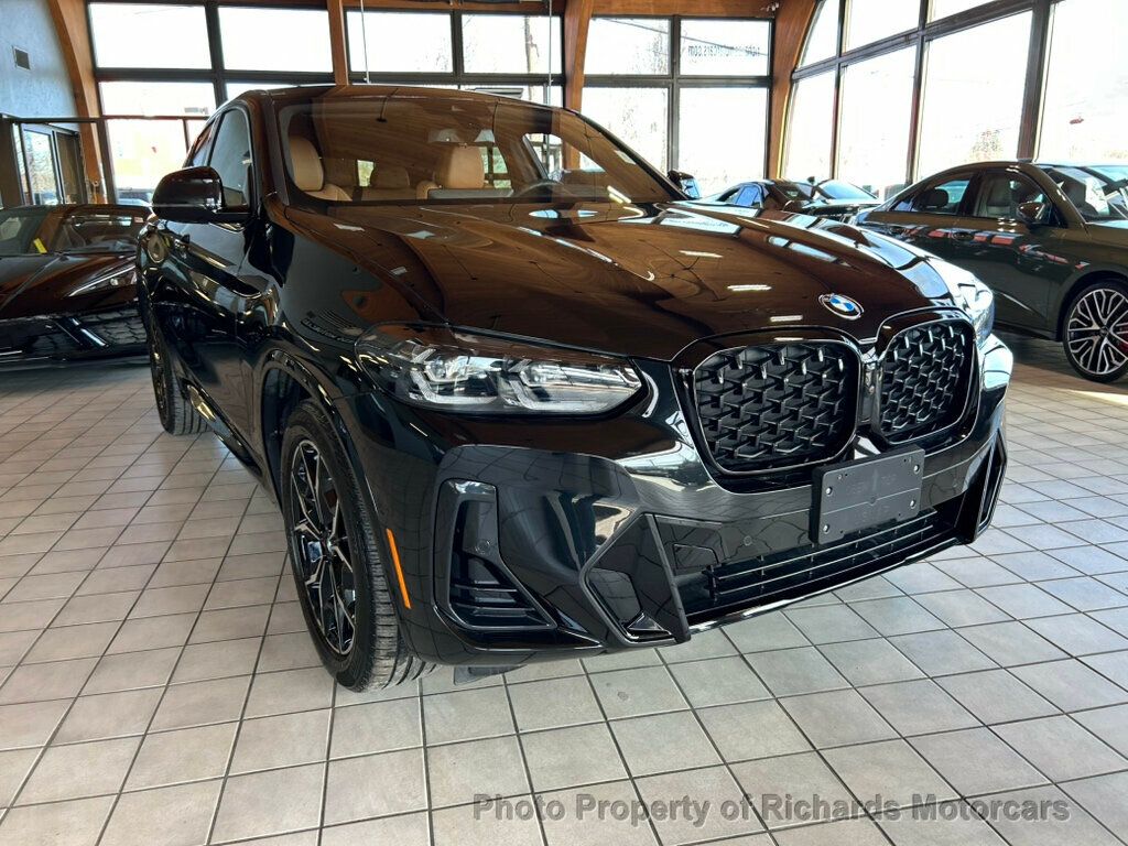 2025 BMW X4 xDrive30i Sports Activity - Black Sapphire Metallic exterior view 10