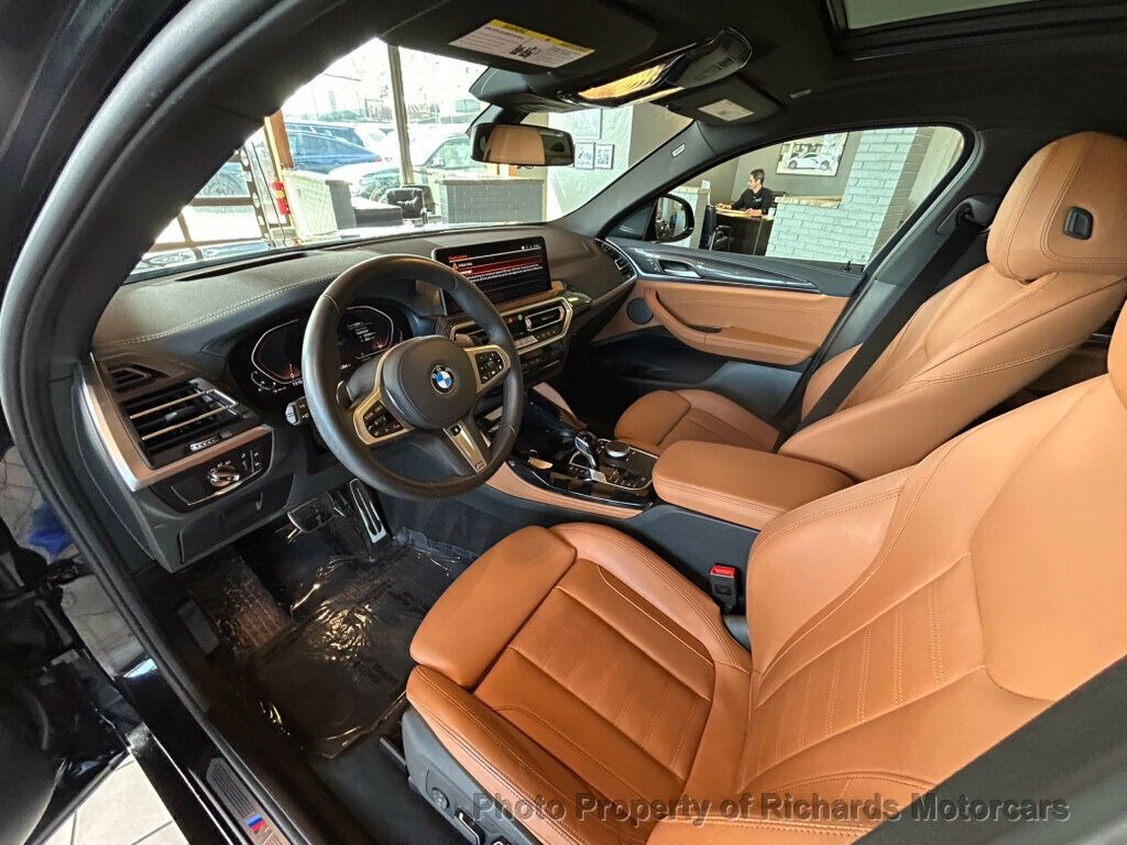 2025 BMW X4 xDrive30i Sports Activity - Black Sapphire Metallic exterior view 12