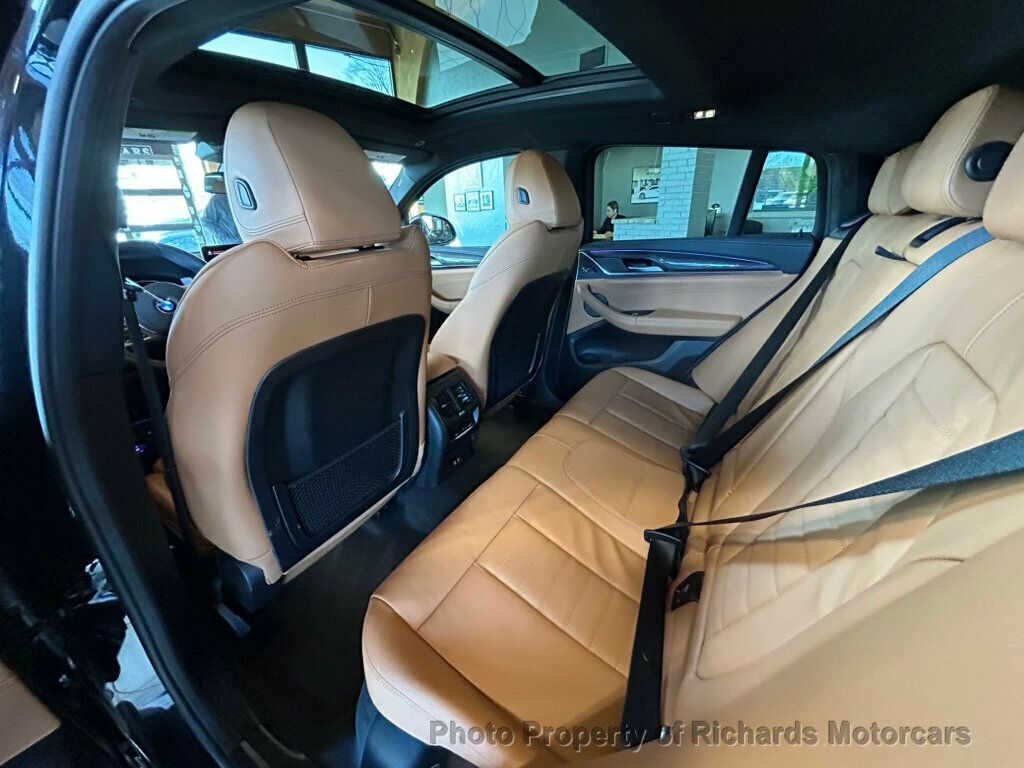 2025 BMW X4 xDrive30i Sports Activity - Black Sapphire Metallic exterior view 16