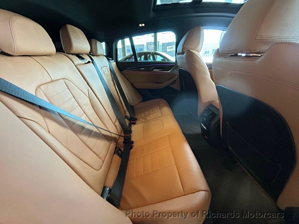 2025 BMW X4 xDrive30i Sports Activity - Black Sapphire Metallic exterior view 18