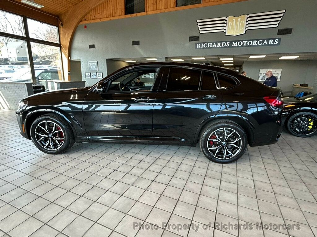 2025 BMW X4 xDrive30i Sports Activity - Black Sapphire Metallic exterior view 8