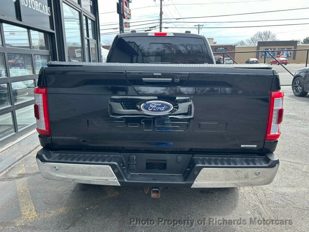 2022 Ford F-150 LARIAT 4WD SuperCrew 6.5' Box - Agate Black Metallic exterior view 4